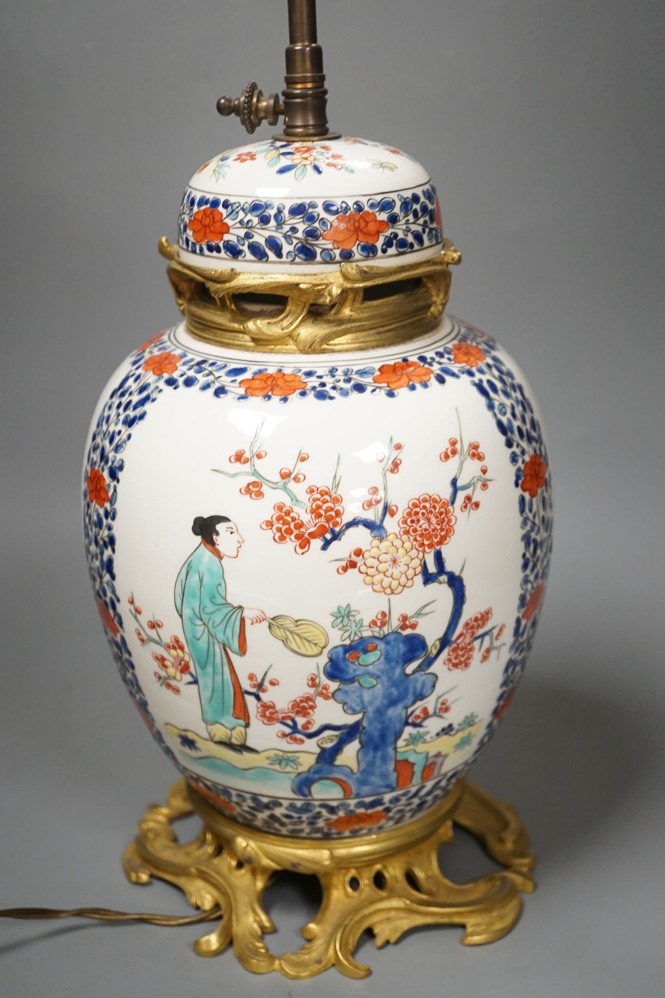 A European porcelain table lamp in the Oriental style, 63 cms high.